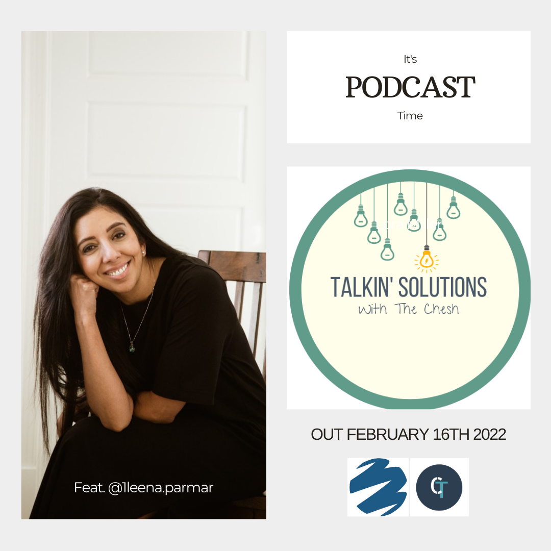 Leena Parmar sat in a chair next to an advertisement for the Talkin' Solution Podcast