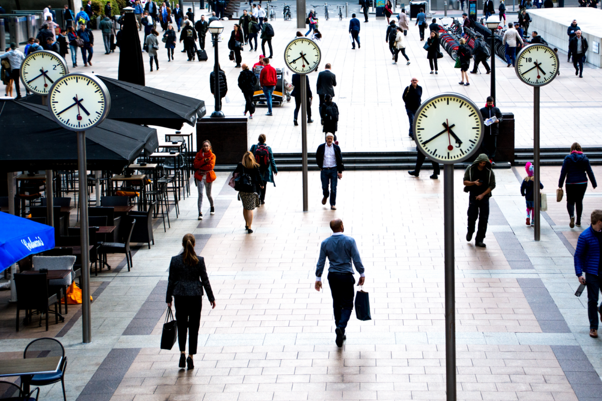 A busy street with clocks