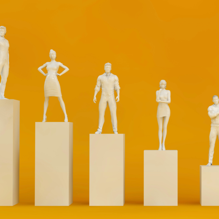 A diverse group of sales professional statues on pedestals.