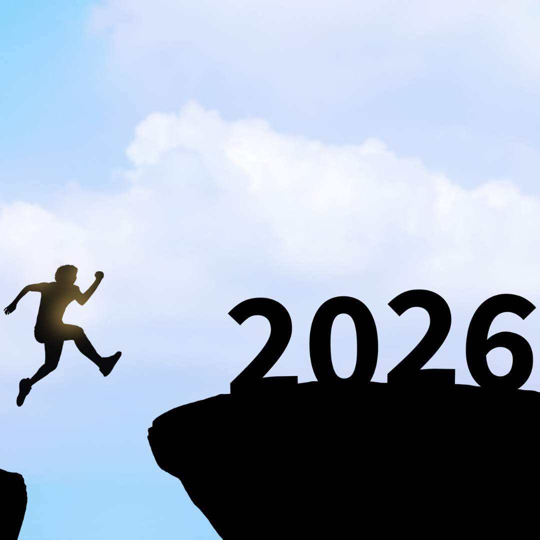 A person jumping onto a rock saying 2026